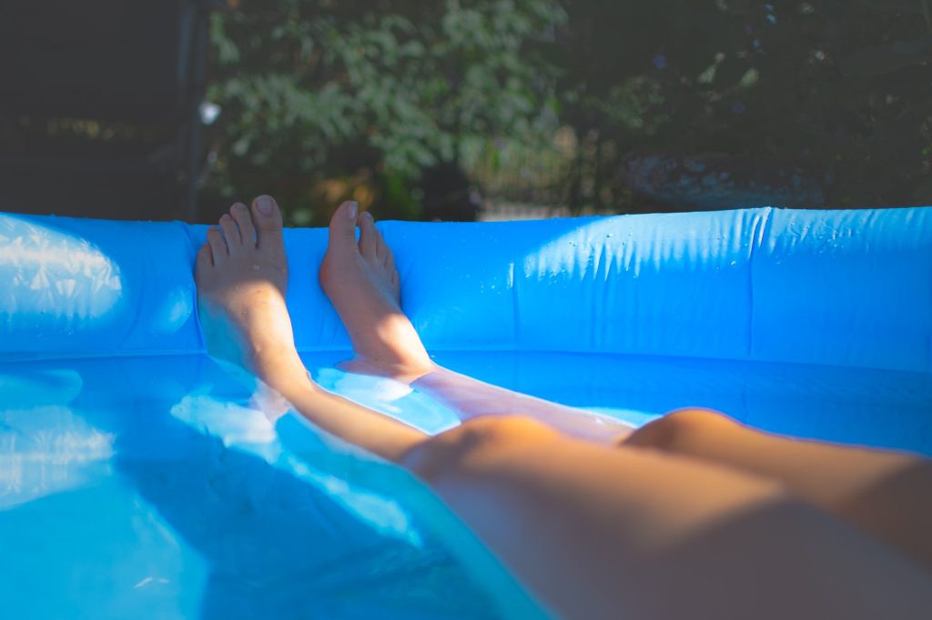 Human female legs water inflatable pool