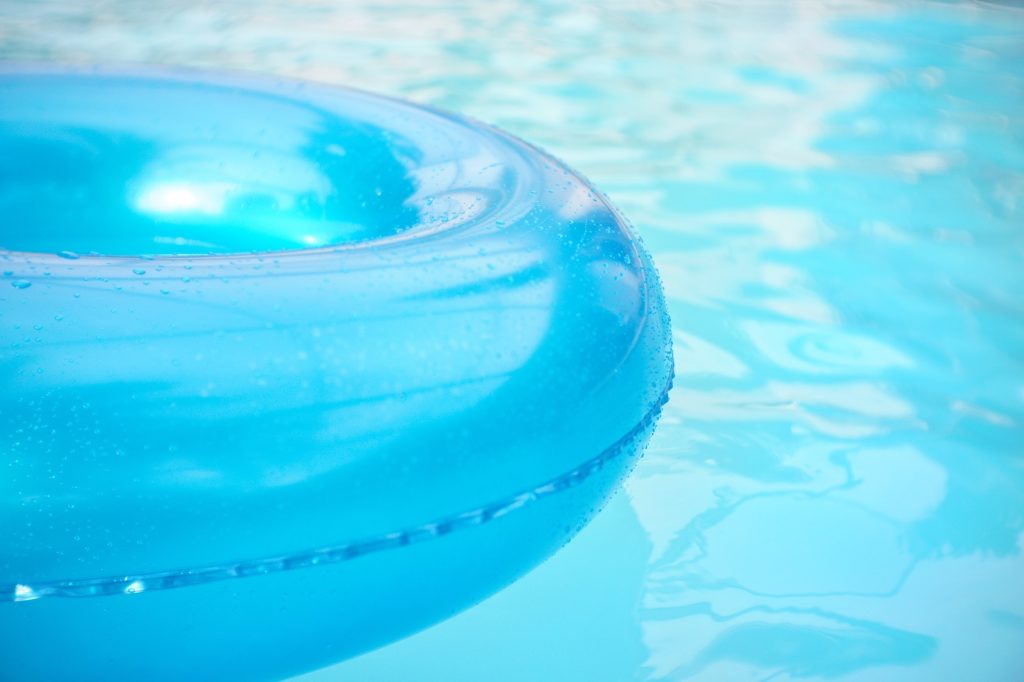 Inflatable in blue pool water
